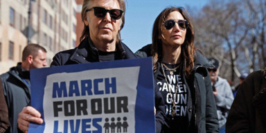 Paul McCartney participates in March For Our Lives in remembrance of his former bandmate, John Lennon