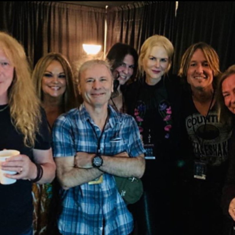 KEITH URBAN And Actress Wife NICOLE KIDMAN Attend IRON MAIDEN Concert 