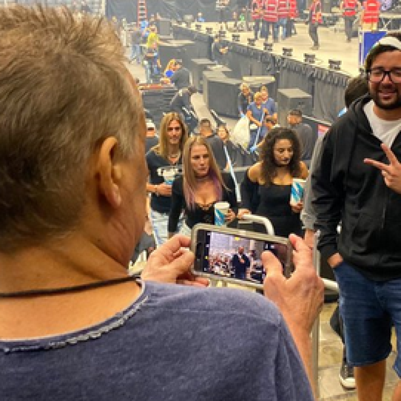 Some guy asks EDDIE VAN HALEN to take a picture of him with the stage behind him at the TOOL show, having no idea who EDDIE is!