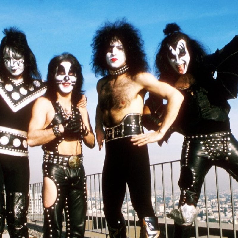 KISS WORKING ON BOOK OF POSTERS