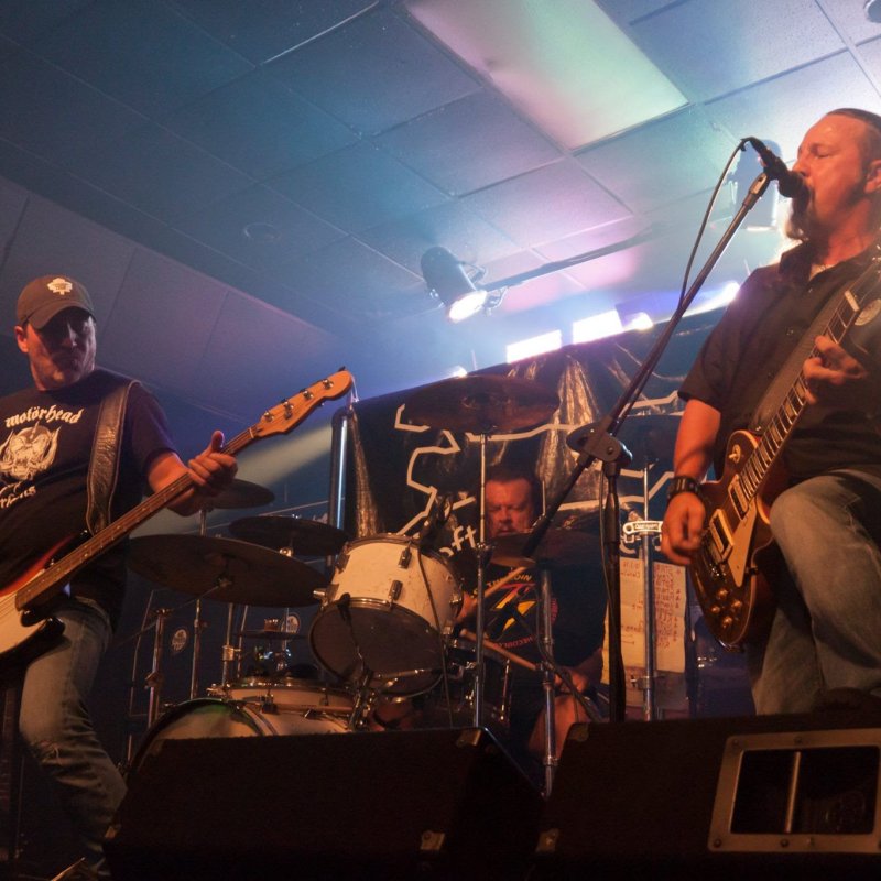 LEFT FOR DEAD "a big hard rock heavy slap! Riffs, riffs and more riffs!"