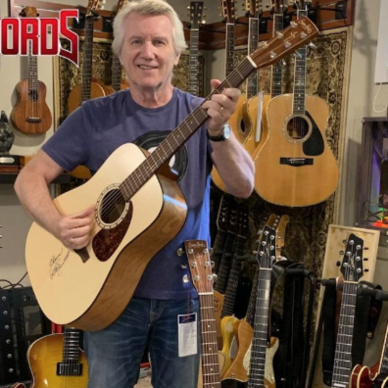 BraveWords has teamed up with former Triumph singer/guitarist Rik Emmett to giveaway a signed Simon & Patrick acoustic guitar!