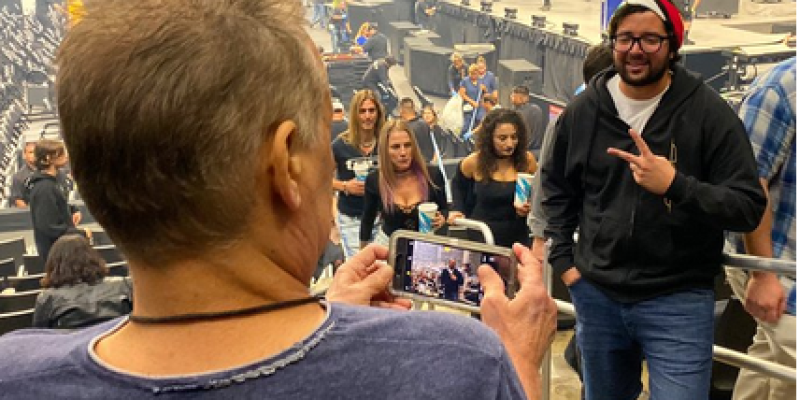 Some guy asks EDDIE VAN HALEN to take a picture of him with the stage behind him at the TOOL show, having no idea who EDDIE is!