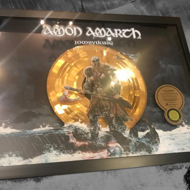 Amon Amarth celebrate "Week of Gold", earns Gold certification in Germany for 2016's 'Jomsviking'; launches video for "Fafner's Gold"
